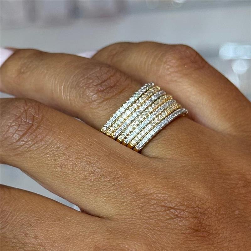 ANEL 7 ELOS COM PEDRAS DE ZIRCÔNIAS CRISTAL FOLHEADO A OURO