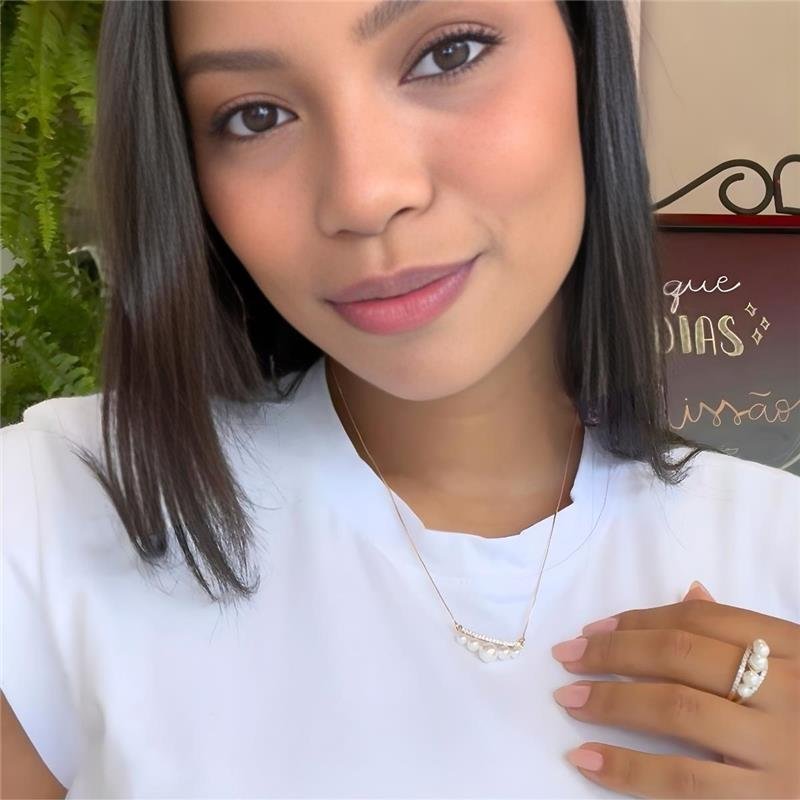 ANEL COM PÉROLAS E PEDRAS DE ZIRCÔNIAS FOLHEADO A OURO