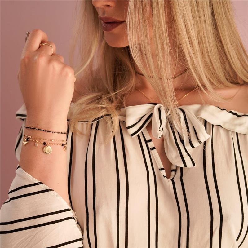 PULSEIRA CRAVEJADA COM PEDRAS DE ZIRCÔNIAS NEGRAS FOLHEADA A OURO